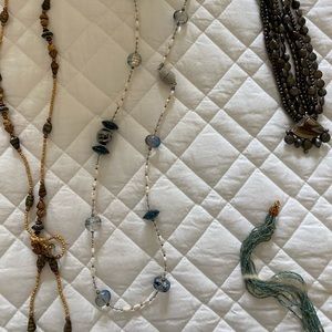 One white long necklace